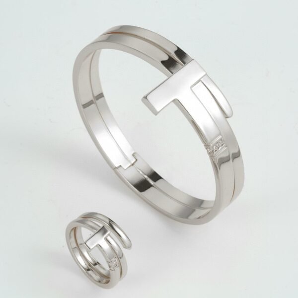 Tiffany & Co. "T" Collection Silver and Gold Bracelet and Ring Set - Image 4